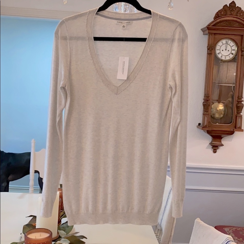 V neck sweater. Never worn.